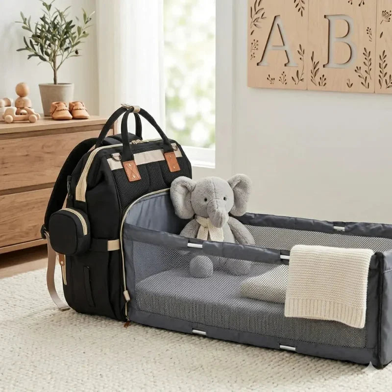 Sac à langer lit noir avec peluche 