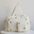 Grand sac à langer avec motif sur table