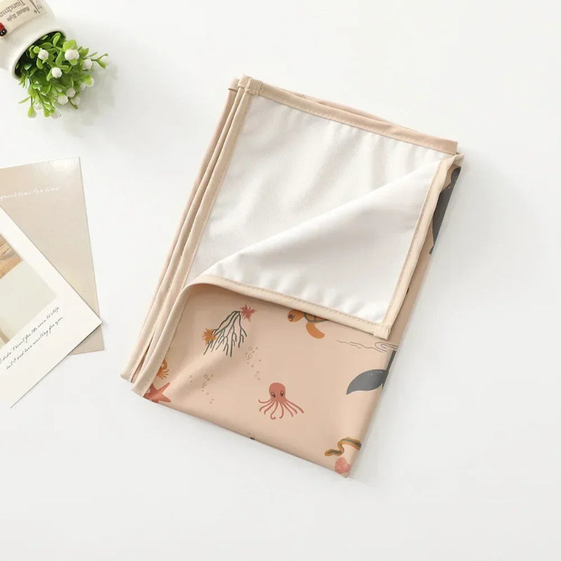 Matelas bébé à langer avec motifs animaux sous marins rose
