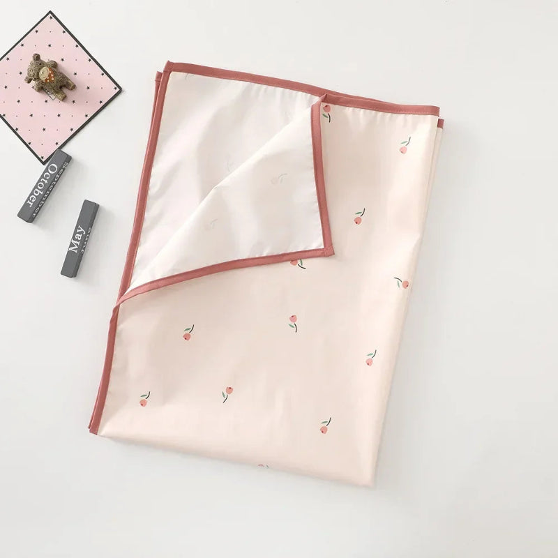 Matelas bébé à langer avec motifs rose