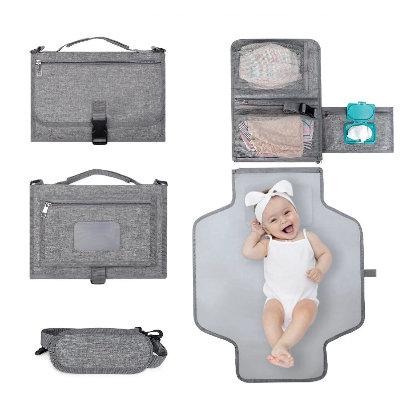 Matelas à langer nomade pour voyages gris foncé déplié