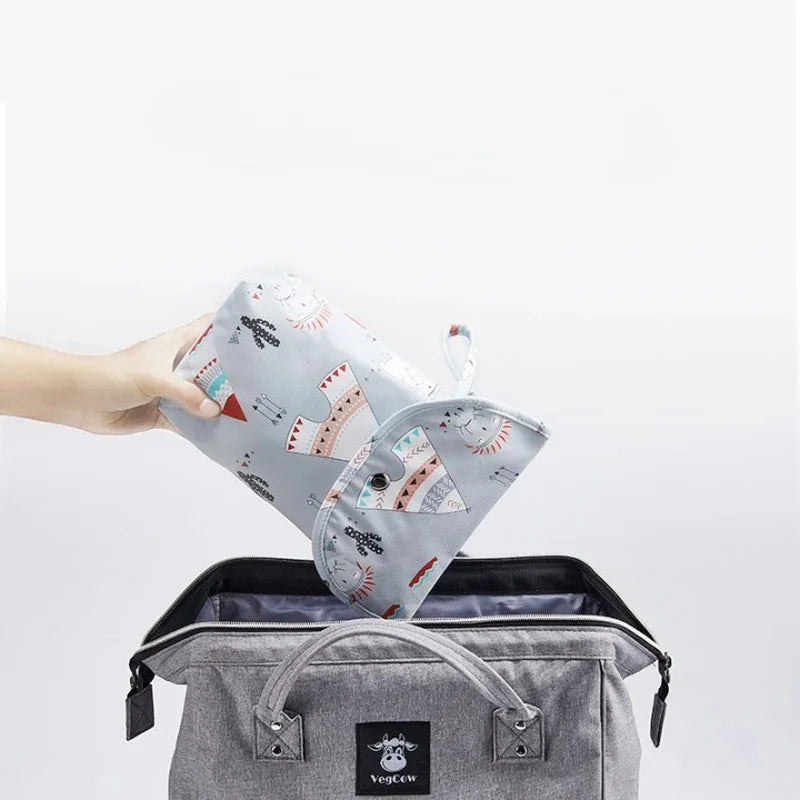 Petit sac à couche dans sac à langer