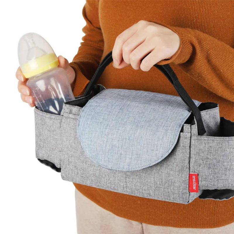 Petit sac à langer pour poussette porté
