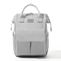 Sac à dos à langer gris