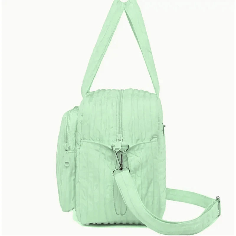 Sac à langer avec bandoulière vert de coté