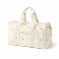 Sac a langer en gaze de coton sur fond blanc