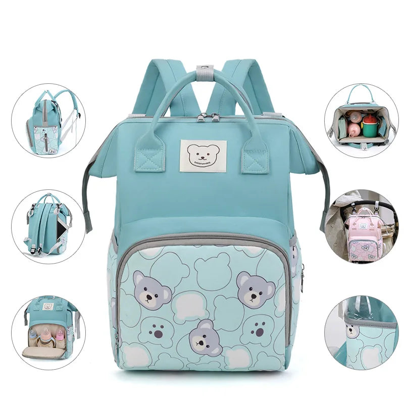 Sac à langer oursons bleu avec ses compartiments 