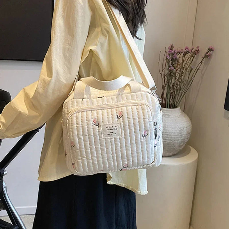 Sac à langer petit à motif fleur porter sur l'épaule