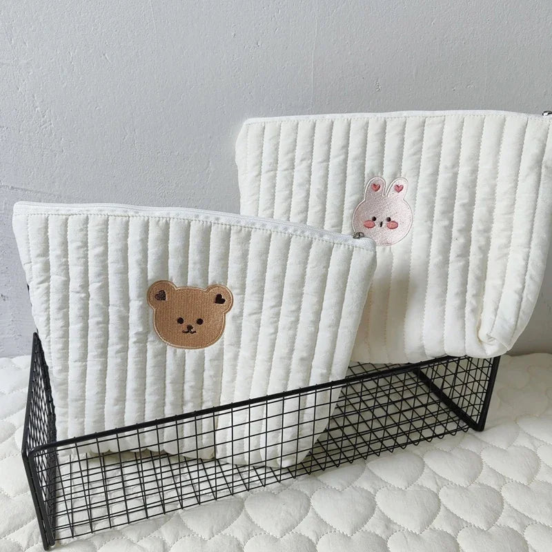Trousse pour bébé voyage dans petit panier