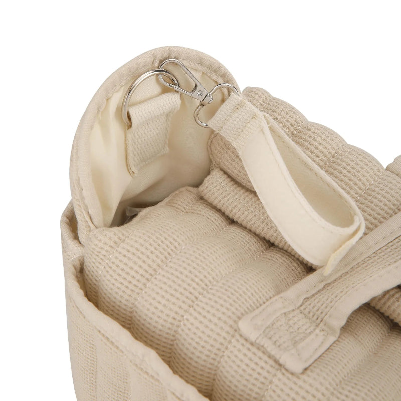 Attache poussette du grand sac à langer bebe